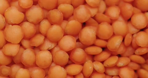 Smooth Camera Movement Over a Handful Red Lentils. Stock Footage 142695861