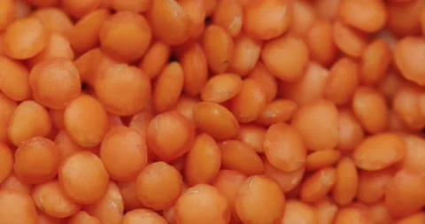 Smooth Camera Movement Over a Handful Red Lentils. Stock Footage 142695896