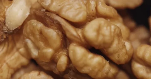 Smooth Camera Movement Over a Handful Walnuts. Stock Footage 142836638