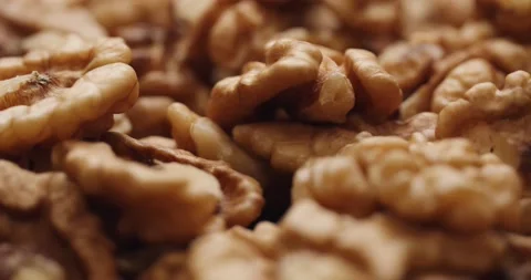 Smooth Camera Movement Over a Handful Walnuts. Stock Footage 142836648