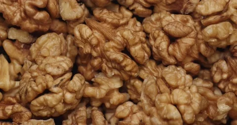Smooth Camera Movement Over a Handful Walnuts. Stock Footage 142836675