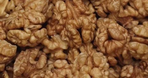 Smooth Camera Movement Over a Handful Walnuts. Stock Footage 142836697