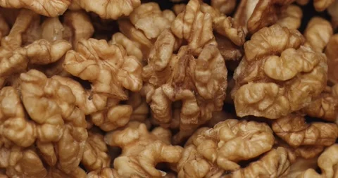 Smooth Camera Movement Over a Handful Walnuts. Stock Footage 142836719
