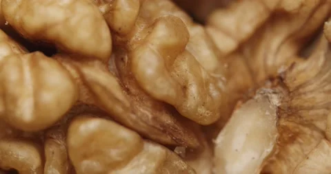 Smooth Camera Movement Over a Handful Walnuts. Stock Footage 142836731