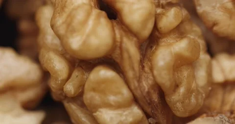 Smooth Camera Movement Over a Handful Walnuts. Stock Footage 142836737