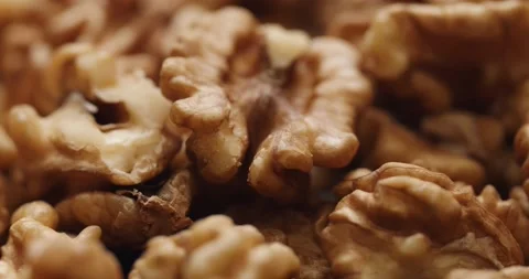 Smooth Camera Movement Over a Handful Walnuts. Stock Footage 142836743