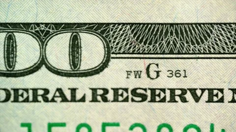 Smooth camera movements when shooting dollars macro Stock Footage 153065987