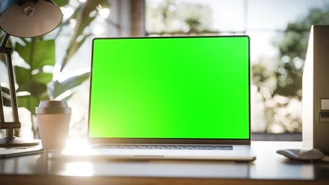 Smooth camera rotation around a laptop on a desk in a stylish home office. .. Stock-Footage 296537343