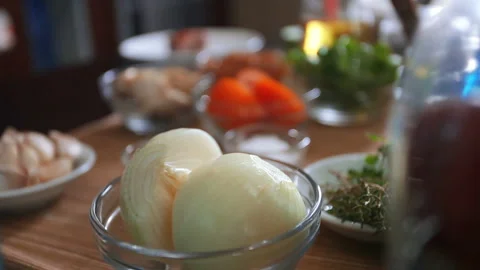 Smooth camera shoot fresh onion on a bowl with some other ingredient stuff Stock Footage 130228159