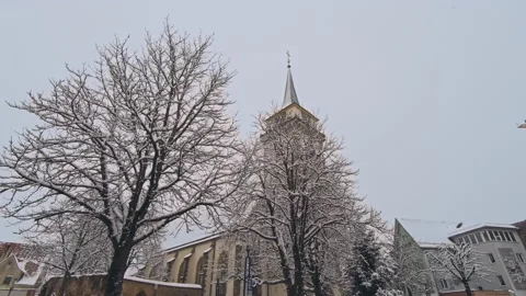 Smooth camera steady slide shot around old Metzingen town Germany in the win Stock Footage 140302191