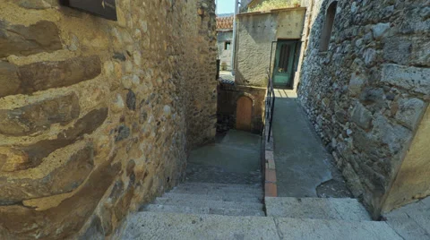 Smooth camera steady wide agle shot along narrow street in the old europe Stock Footage 65908025
