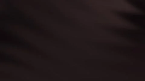 Smooth chocolate brown gradient background featuring subtle twirl motion te.. Stock Illustration