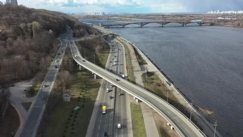 Smooth cinematic flying back over the Kyiv interchange with a view of the metro Stock Footage 219743162