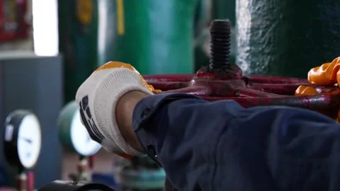 Smooth closing of the large gate valve Stock Footage 249525970