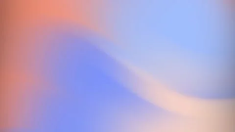 A smooth color gradient transitions from reddish-orange to blue-violet and peach Stock Footage 294661957