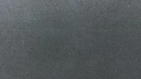 Smooth dark charcoal graphite texture. Abstract seamless black stone background. Stock Footage 331120268