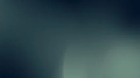 Smooth dark gradient with subtle texture, seamless loop background. 4K. Stock Footage 309700885