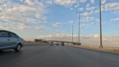 Smooth desert highway exploration along Cairo Fayoum Desert Road wide landscapes Stock-Footage 330083357