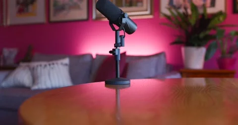 Smooth dolly-back shot showcases Shure SM7B professional microphone with a Stock Footage 237939559