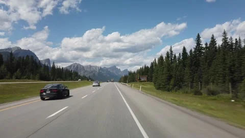 Smooth Drive Towards Banff During Sunny Summer Day Stock Footage 146854229