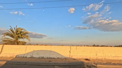 Smooth driving experience through Cairo Fayoum Desert Road desert scenery Stock Footage 330088948