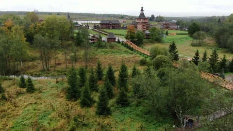 Smooth drone approach over green landscape Stockbeeldmateriaal 323974365