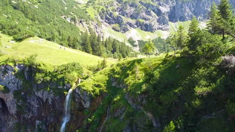 Smooth Drone Ascend Over Waterfall from Unterer Gaisalpsee Stock Footage 282444140