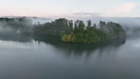 Smooth drone flight over lake and lake shore. Stock Footage 230720655