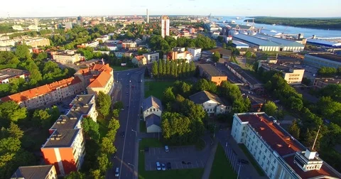 Smooth drone flight through Klaipeda City at low altitude - 23 Stock Footage 79518114