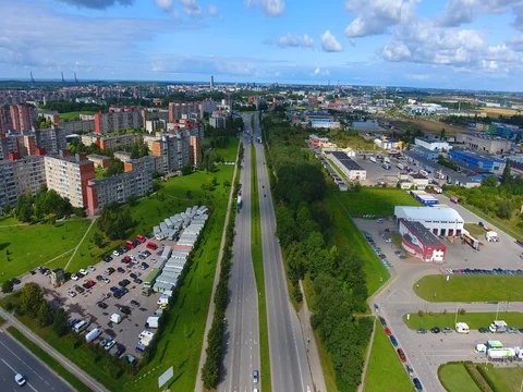 Smooth drone flight through Klaipeda City at low altitude - 20 Stock Footage 79520848
