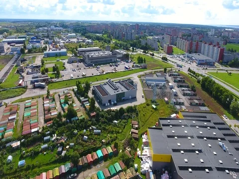 Smooth drone flight through Klaipeda City at low altitude - 19 Vídeo Stock 79542082