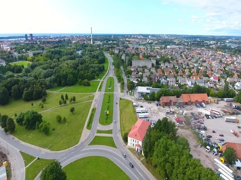 Smooth drone flight through Klaipeda City at low altitude - 16 스톡 동영상 79543262