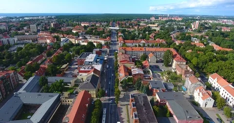 Smooth drone flight through Klaipeda City at low altitude - 10 스톡 동영상 79551911