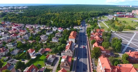 Smooth drone flight through Klaipeda City at low altitude - 8 스톡 동영상 79553171