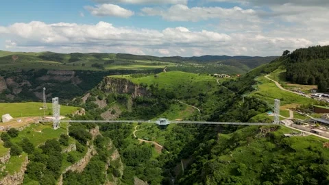 Smooth Drone Fly Toward Glass Bridge in Dashbashi Canyon Stock Footage 339673704