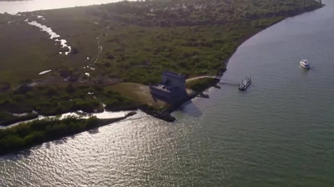 Smooth drone glide over the dry moat and entrance bridge of the centuries-old Vidéo 332811875