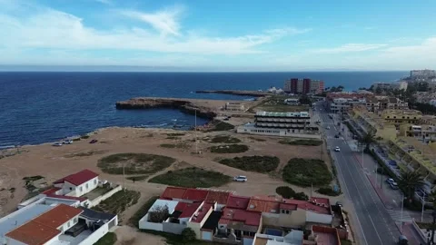 Smooth Drone Glide Over Tranquil Coastal Waters Vídeos de archivo 307702611