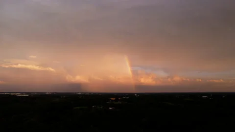 Smooth Drone Hyperlapse of Beautiful Rainbow during Sunset Stock Footage 204021089