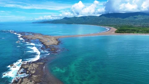 Smooth drone orbit around Whale Tail and Uvita Beach, Costa Rica Vídeos de archivo 328129612