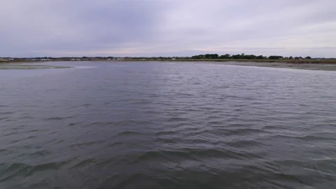 Smooth drone shot across the surface of a river. Stock Footage 230168921