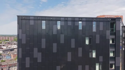 Smooth Drone Shot Along Dark Glass Facade In UK City Stock-Footage 334630620