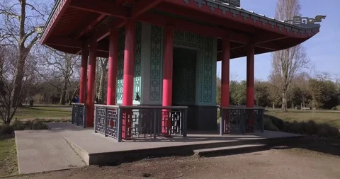 Smooth drone shot of Asian temple in a park Stock Footage