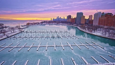 Smooth drone shot drifting above the Loop in Chicago at winter sunrise. Stock Footage 332264061