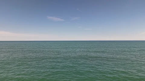 Smooth Drone View Over Open Blue Sea in Natural Daylight 4K Stock Footage 337785743