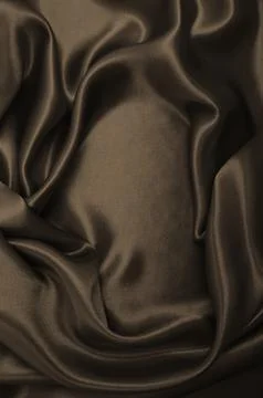 Smooth elegant brown silk or satin luxury cloth texture as abstract backgro.. Stock Photos