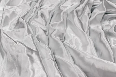 Smooth elegant silver silk or satin luxury cloth texture Stock Photos