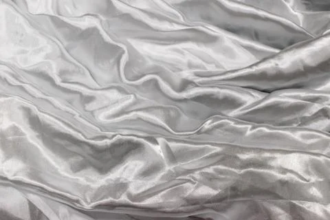 Smooth elegant silver silk or satin luxury cloth texture Foto stock