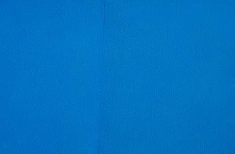Smooth embossed closeup napkin texture. Classic blue background Stock Photos