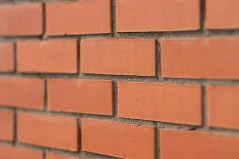 Smooth even red brickwork wall pattern, flat lighting, minimal shadows, neutr Stock Photos
