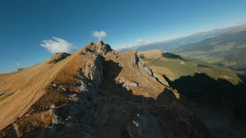 Smooth flight along the mountain range, filmed by FPV drone. Seceda, Italy Stock Footage 293637427